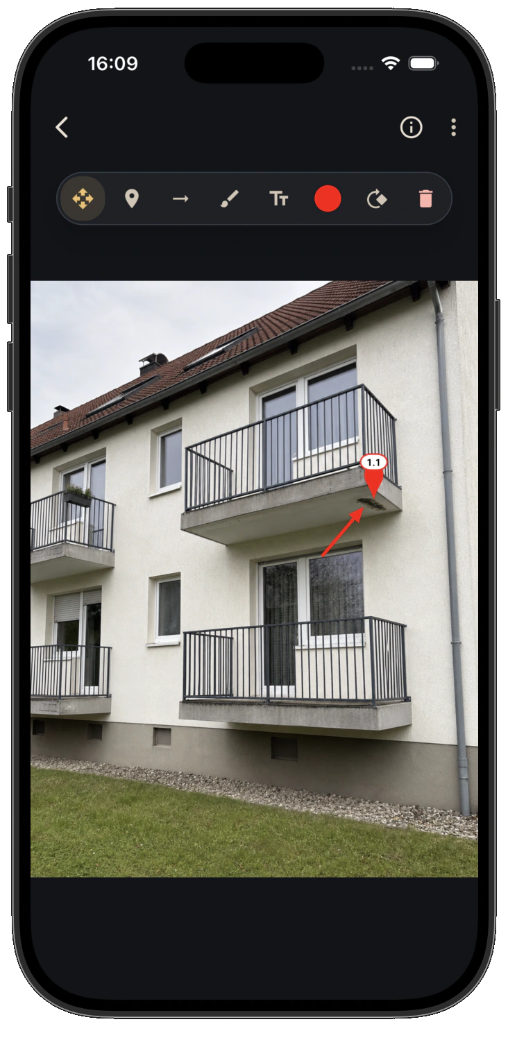 A building defect annotated in QuickReports on a smartphone